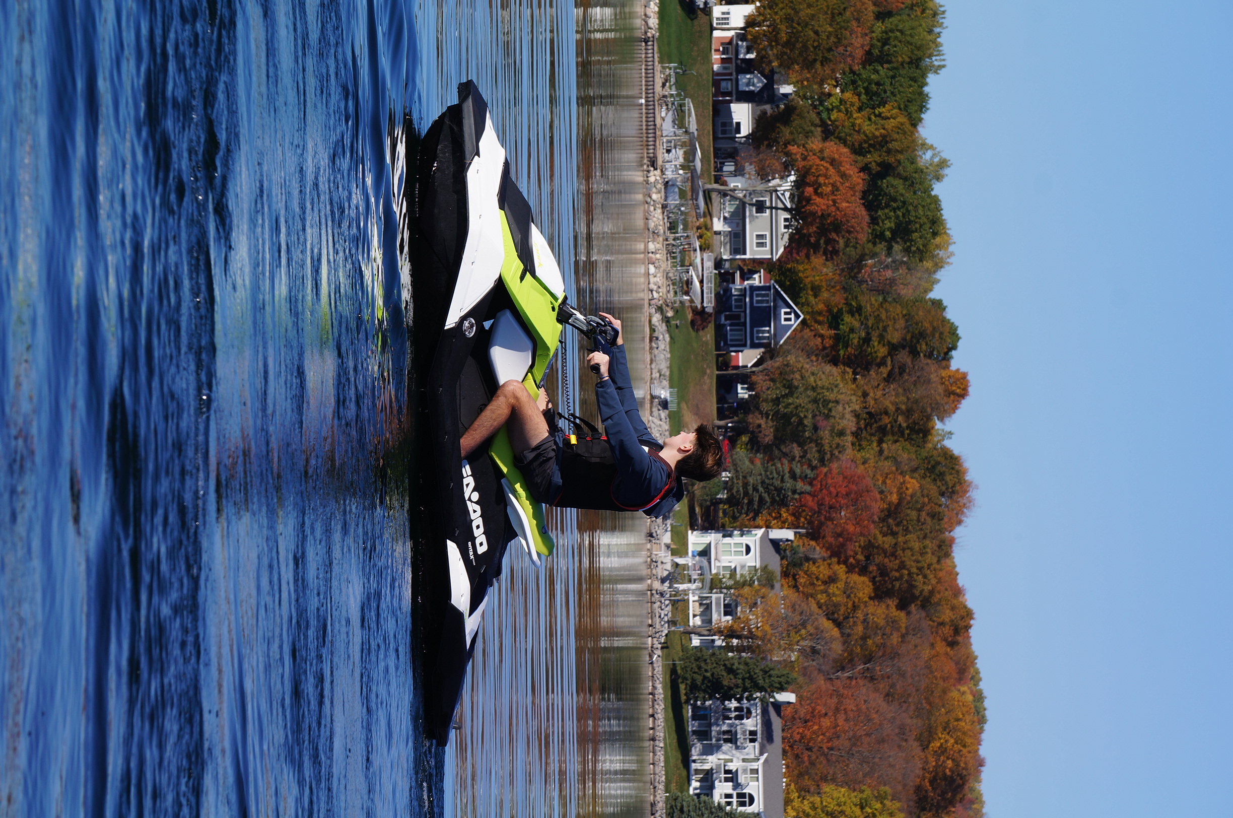 White and lime Sea-Doo Spark at the shoreline